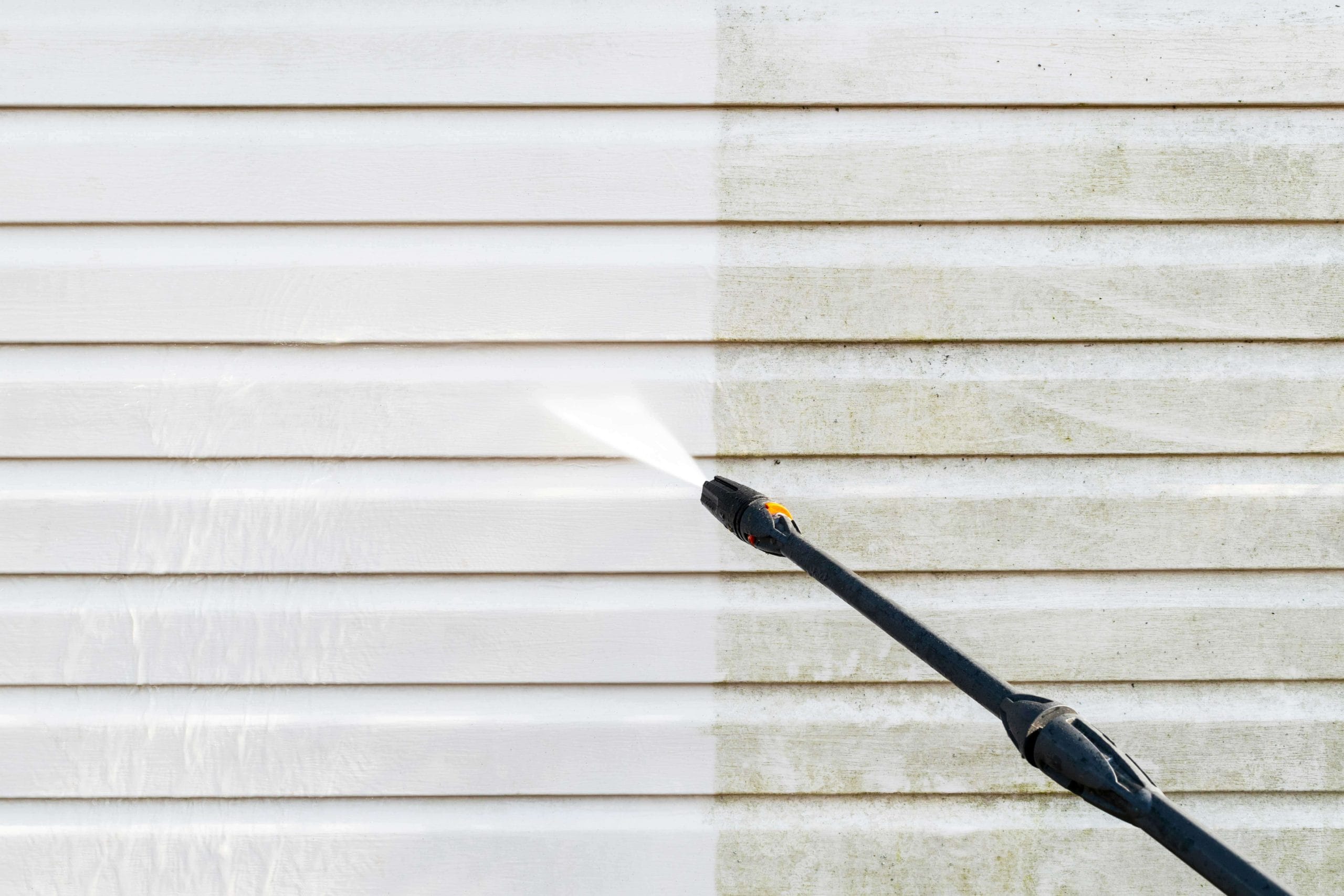 Residential exterior power washing in Phoenix, AZ: Before and after transformation.